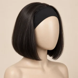 Illustrative natural dark bob wig with a black headband on a mannequin; final cap and texture confirmed by sample