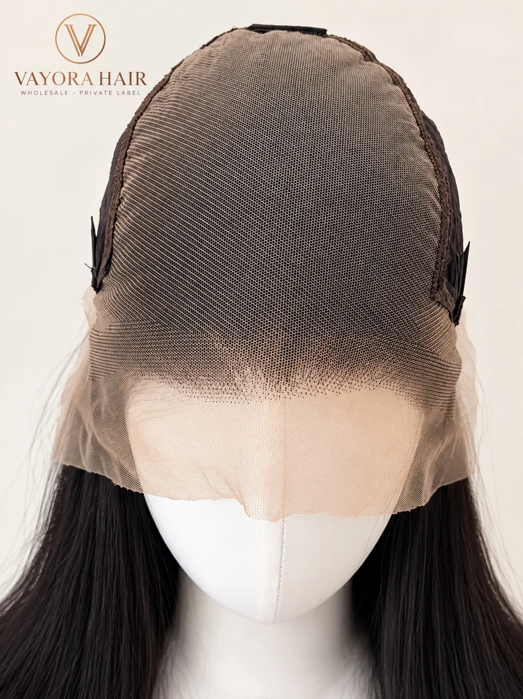 Front lace area and cap construction displayed on a mannequin